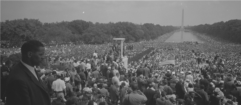 March on Washington for Jobs and Freedom, 1963, in Washington, D.C. Photo by Warren K. Leffler, courtesy of the Library of Congress. A large crowd of people in front of the reflecting pool and the Washington Monument.